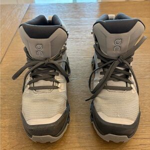 On woman’s hiking boots size 7. Worn once.